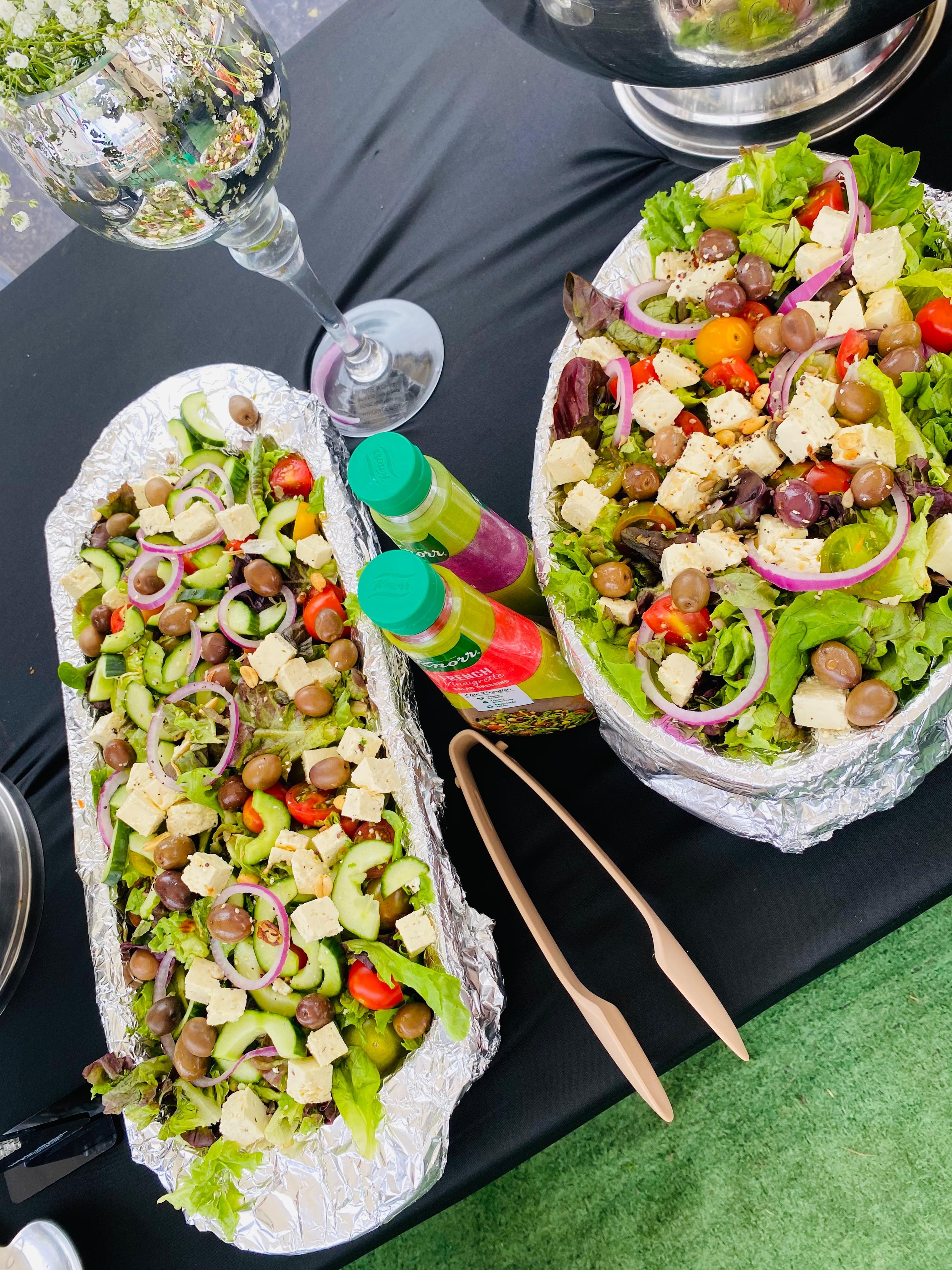 Fresh Greek-style salads with feta, olives, and tomato